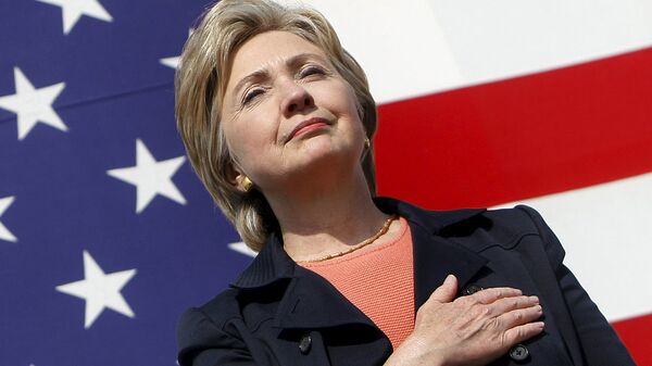 U.S. Senator Hillary Clinton (D-NY) places her hand over her heart during the National Anthem at the 30th annual Harkin Steak Fry in Indianola, Iowa, in this September 16, 2007 file photo - Sputnik International