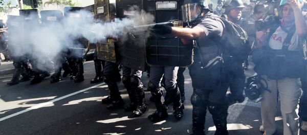 Police fire rubber bullets at protestors in Sao Paulo, Brazil, Thursday, June 12, 2014 Police fire rubber bullets at protestors in Sao Paulo, Brazil, Thursday, June 12, 2014 - Sputnik International