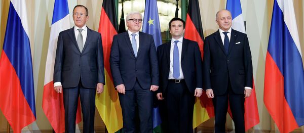 German Foreign Minister Frank-Walter Steinmeier, second left, welcomes his counterparts from France, Laurent Fabius, right, Russia, Sergey Lavrov, left, and Ukraine, Pavlo Klimkin, second right, for a meeting on the situation in Ukraine in Berlin, Germany, Monday, Jan. 12, 2015. German Foreign Minister Frank-Walter Steinmeier, second left, welcomes his counterparts from France, Laurent Fabius, right, Russia, Sergey Lavrov, left, and Ukraine, Pavlo Klimkin, second right, for a meeting on the situation in Ukraine in Berlin, Germany, Monday, Jan. 12, 2015. - Sputnik International