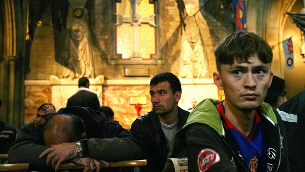 Some of 41 failed Afghan asylum seekers sit in St. Patricks Cathedral, Dublin. File Photo - Sputnik International