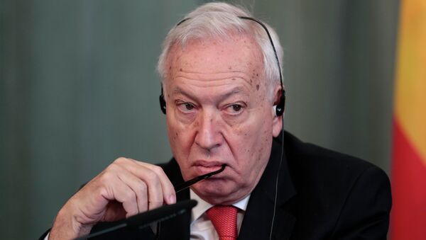 Spanish Foreign Minister Jose Manuel Garcia-Margallo listens to a question during a joint press conference with Russian Foreign Minister Sergey Lavrov in Moscow - Sputnik International