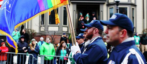The color guard for LGBT veterans group OutVets marches down Broadway during the St. Patrick's Day Parade in South Boston, Massachusetts The color guard for LGBT veterans group OutVets marches down Broadway during the St. Patrick's Day Parade in South Boston, Massachusetts - Sputnik International