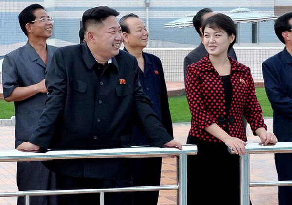 North Korean leader Kim Jong Un, front left, accompanied by his wife Ri Sol Ju, front right, inspects the Rungna People's Pleasure Ground in Pyongyang - Sputnik International