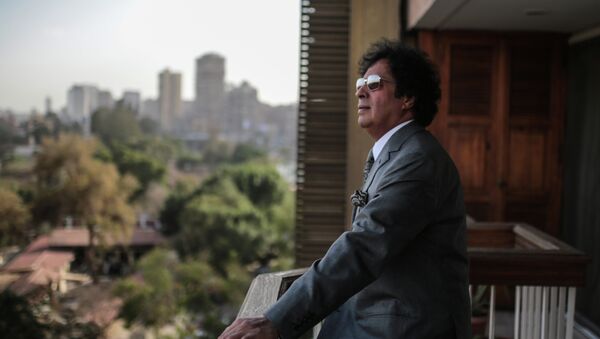 Ahmed Qaddaf al-Dam, cousin of Libya's former president Muammar Gaddafi, poses for a photo at his apartment, in Cairo, Egypt, Wednesday, Feb. 25, 2015 - Sputnik International