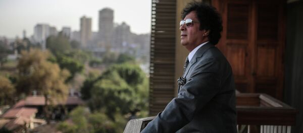 Ahmed Qaddaf al-Dam, cousin of Libya's former president Muammar Gaddafi, poses for a photo at his apartment, in Cairo, Egypt, Wednesday, Feb. 25, 2015 - Sputnik International