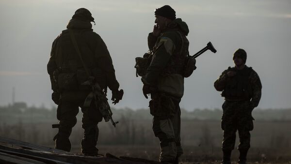 Ukrainian servicemen guard their position in the village of Shyrokyne near Mariupol, eastern Ukraine, Wednesday, Feb. 25, 2015 - Sputnik International