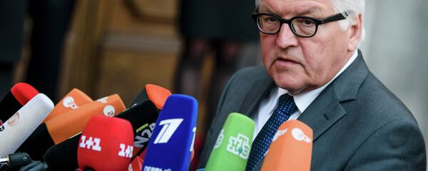 German Foreign Minister Frank-Walter Steinmeier speaks to journalists prior to a meeting of foreign ministers to examine the implementation of the Minsk peace accords German Foreign Minister Frank-Walter Steinmeier speaks to journalists prior to a meeting of foreign ministers to examine the implementation of the Minsk peace accords - Sputnik International