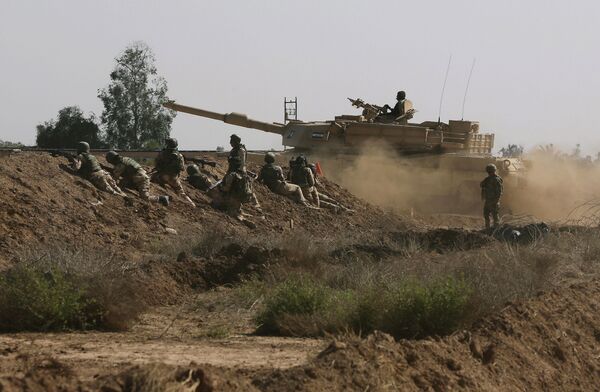 Iraqi security forces participate in a drill as U.S. forces help train them in Taji, north of Baghdad, Iraq. Iraqi security forces participate in a drill as U.S. forces help train them in Taji, north of Baghdad, Iraq. - Sputnik International