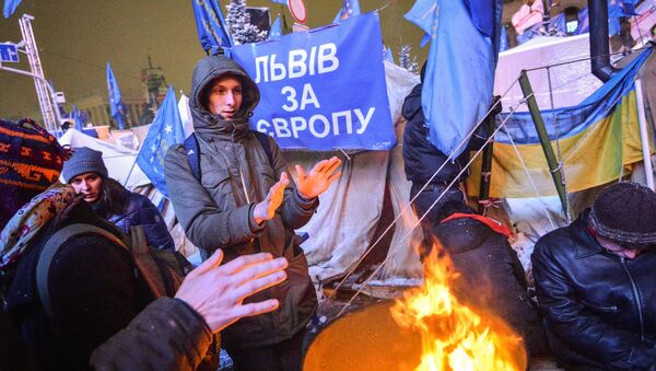 Police storm barricades in Kiev - Sputnik International