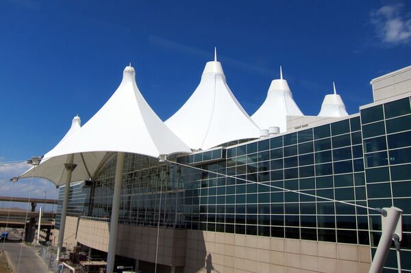 The two Denver International Airport TSA conspired with one another to allow the male agent to fondle men's genitals. The two Denver International Airport TSA conspired with one another to allow the male agent to fondle men's genitals. - Sputnik International