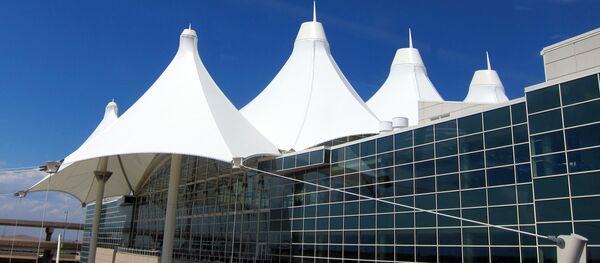 The two  Denver International Airport TSA conspired with one another to allow the male agent to fondle men's genitals. - Sputnik International