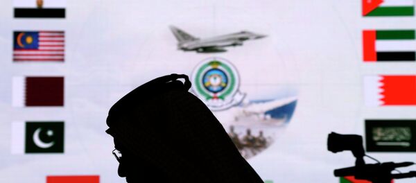 A Saudi man walks past a screen projecting images during a military briefing on the Saudi-led coalition's strikes in Yemen on Houthi rebels, in Riyadh, Saudi Arabia. A Saudi man walks past a screen projecting images during a military briefing on the Saudi-led coalition's strikes in Yemen on Houthi rebels, in Riyadh, Saudi Arabia. - Sputnik International