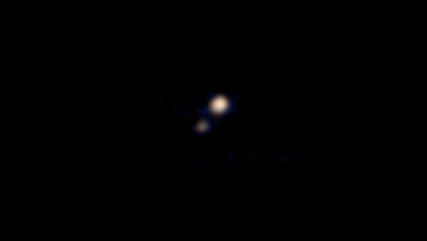 First Color Images of Pluto - Sputnik International