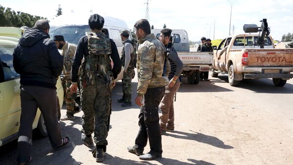 Jabhat al-Nusra militants at the entrance of Idlib city - Sputnik International