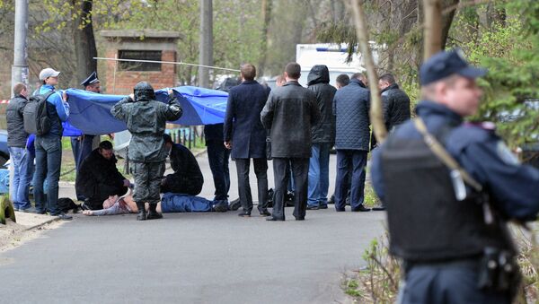Scene of the murder of journalist Oles Buzina in Kiev, April 16. Buzina was shot dead near the entrance to his house. - Sputnik International