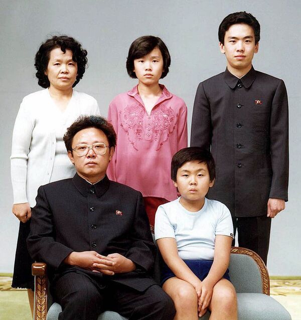 North Korean leader Kim Jong Il (L) with son Kim Jong Nam (R), former wife's sister Sung Hye Rang and her children Lee Nam Ok and Lee Il Nam behind tnem. North Korean leader Kim Jong Il (L) with son Kim Jong Nam (R), former wife's sister Sung Hye Rang and her children Lee Nam Ok and Lee Il Nam behind tnem. - Sputnik International