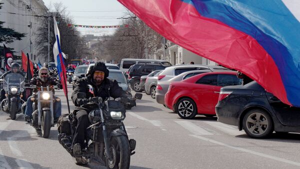 President of the All-Russian Motorcycle Club Night Wolves Alexander Zaldostanov, center, during a motor rally called Russian Spring Roads timed to coincide with the first anniversary of Crimea's reunification with Russia, in Sevastopol. - Sputnik International