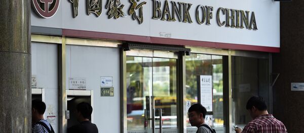 People wait outside a Bank of China branch in Beijing People wait outside a Bank of China branch in Beijing - Sputnik International