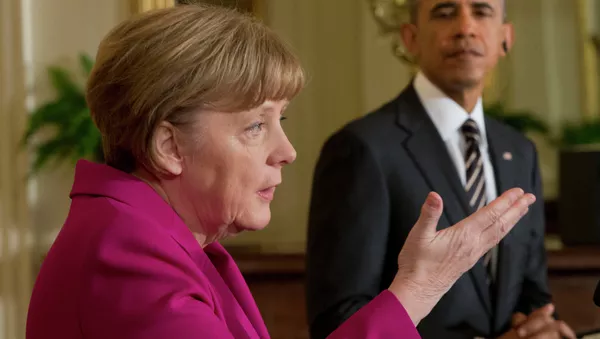 President Barack Obama (right) and German Chancellor Angela Merkel - Sputnik International