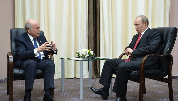 Russian President Vladimir Putin (right) and FIFA President Joseph S. Blatter - Sputnik International