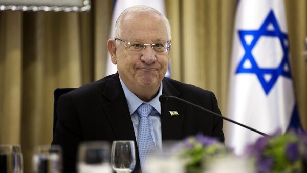 Israeli President Reuven Rivlin sits for consultations, with representatives of parties elected to parliament (Knesset) last week, at his residence in Jerusalem on March 22, 2015 - Sputnik International