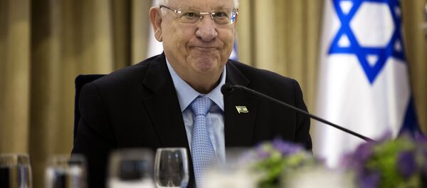Israeli President Reuven Rivlin sits for consultations, with representatives of parties elected to parliament (Knesset) last week, at his residence in Jerusalem on March 22, 2015 - Sputnik International