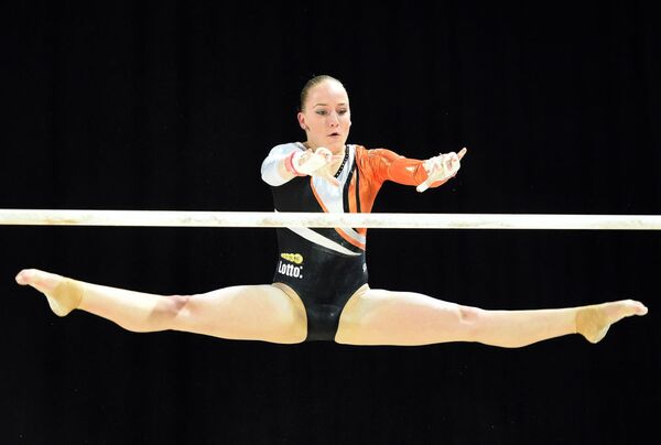 Dutch gymnast Sanne Wevers competes in the uneven bars event - Sputnik International