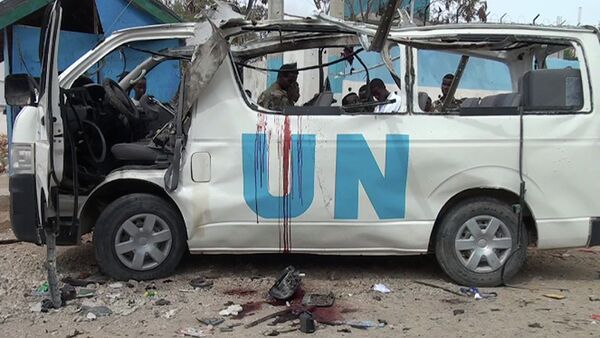 Blood is seen in the shell of a UN van following a bomb attack that killed at least six UN workers on April 20, 2015 in the northeastern town of Garowe - Sputnik International
