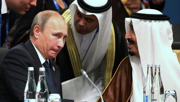 President of Russia Vladimir Putin and Crown Prince Salman bin Albdulaziz Al Saud talk through their interpreters during a plenary session at the G-20 summit in Brisbane, Australia, Saturday, Nov. 15, 2014 - Sputnik International