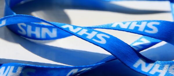 A fetching NHS blue lanyard. A fetching NHS blue lanyard. - Sputnik International