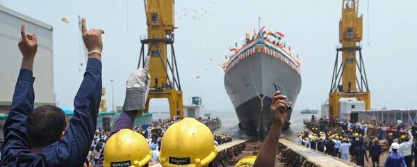 Indian staff and guests cheer as INS Visakhapatnam, the first Indian Navy P15-B stealth destroyer, is launched in Mumbai on April 20, 2015 - Sputnik International