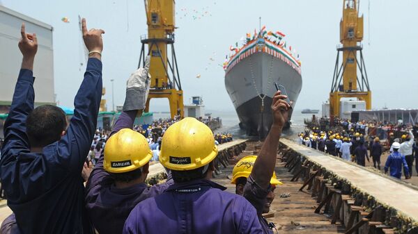 Indian staff and guests cheer as INS Visakhapatnam, the first Indian Navy P15-B stealth destroyer, is launched in Mumbai on April 20, 2015 - Sputnik International