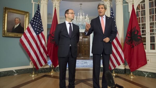 US Secretary of State John Kerry and Albania Foreign Minister Ditmir Bushati (L) speak to the media prior to meetings at the State Department in Washington, DC, April 20, 2015 - Sputnik International