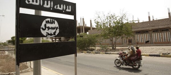 An al-Qaida logo is seen on a street on the town of Jaar in southern Abyan province, Yemen An al-Qaida logo is seen on a street on the town of Jaar in southern Abyan province, Yemen - Sputnik International