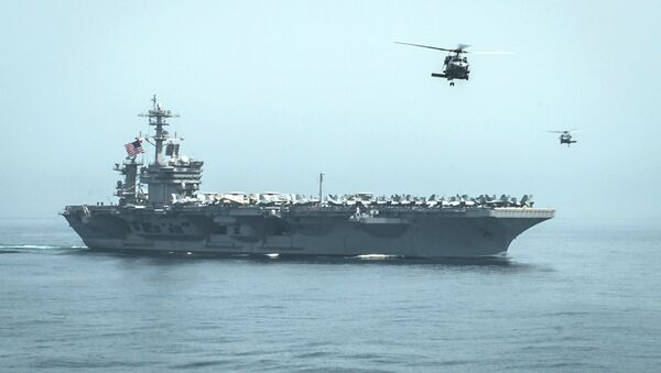Helicopters fly from the aircraft carrier USS Theodore Roosevelt - Sputnik International
