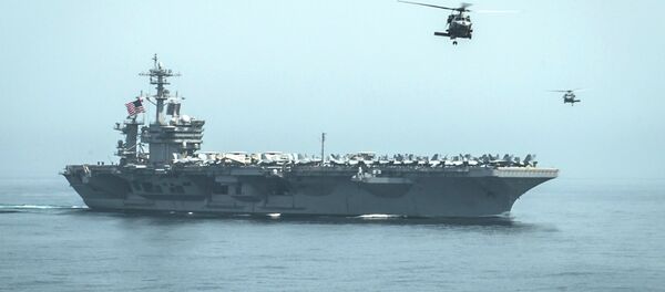 Helicopters fly from the aircraft carrier USS Theodore Roosevelt - Sputnik International