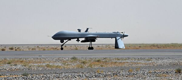  US Predator unmanned drone armed with a missile - Sputnik International