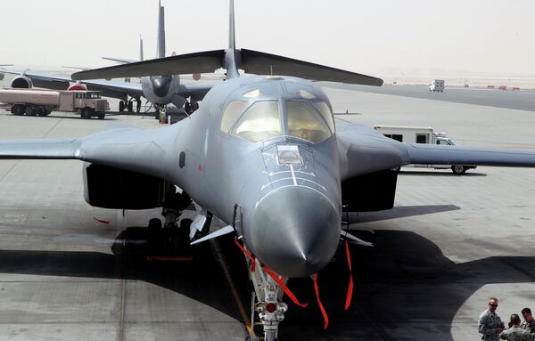 In this photo taken on March 9, 2015, a B-1 bomber is seen at the al-Udeid Air Base in Doha, Qatar - Sputnik International
