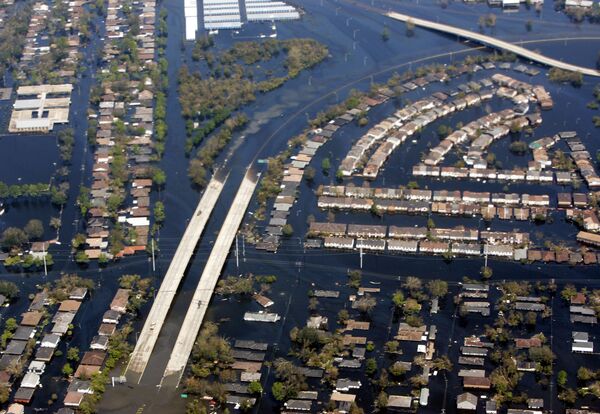 The damage from hurricane Katrina near New Orleans is seen from Air Force One. In 2005 hurricane Katrina, the largest and third strongest hurricane ever recorded to make landfall in the US, left 1,300 people dead. - Sputnik International