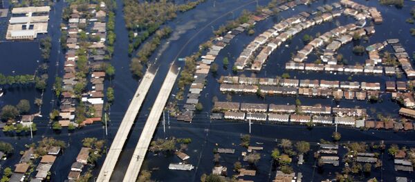 The damage from hurricane Katrina near New Orleans is seen from Air Force One. In 2005 hurricane Katrina, the largest and third strongest hurricane ever recorded to make landfall in the US, left 1,300 people dead. - Sputnik International