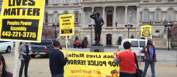 Demonstrators protest the death of Freddie Gray outside Baltimore City Hall on Monday, April 20, 2015. Demonstrators protest the death of Freddie Gray outside Baltimore City Hall on Monday, April 20, 2015. - Sputnik International