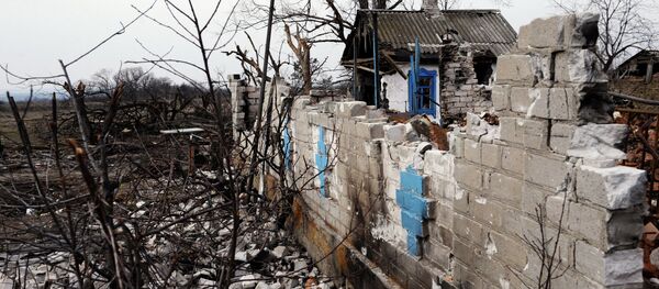A destroyed structure in Logvinovo in the Donetsk Region A destroyed structure in Logvinovo in the Donetsk Region - Sputnik International