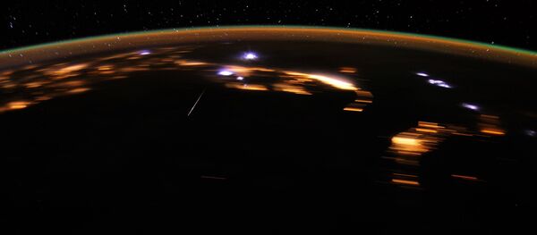 Stunning Lyrids Over Earth at Night Stunning Lyrids Over Earth at Night - Sputnik International