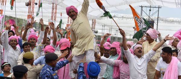 Indian Congress Party supporters shout slogans during a rally in New Delhi on April 19, 2015 Indian Congress Party supporters shout slogans during a rally in New Delhi on April 19, 2015 - Sputnik International