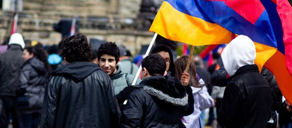 Young people holding the Armenian flag - Sputnik International
