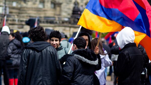 Young people holding the Armenian flag - Sputnik International