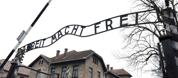 File photo of the sign Arbeit macht frei (Work makes you free) at the main gate of the former German Nazi concentration and extermination camp Auschwitz in Oswiecim January 19, 2015 File photo of the sign Arbeit macht frei (Work makes you free) at the main gate of the former German Nazi concentration and extermination camp Auschwitz in Oswiecim January 19, 2015 - Sputnik International