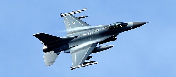 In this photo taken Wednesday, April 8, 2015, a U.S. military fighter jet participates in a NATO Baltic Air Policing Mission practice mission in the Tapa training area, some 70 kilometers (43 miles) southwest of Tallinn, Estonia In this photo taken Wednesday, April 8, 2015, a U.S. military fighter jet participates in a NATO Baltic Air Policing Mission practice mission in the Tapa training area, some 70 kilometers (43 miles) southwest of Tallinn, Estonia - Sputnik International