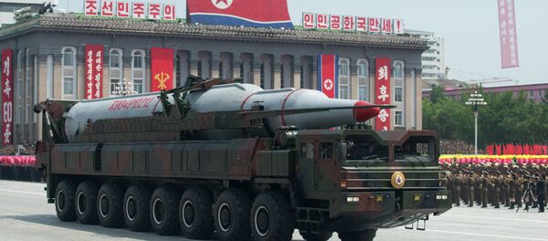 A North Korean Taepodong-class missile is displayed during a military parade past Kim Il-Sung square marking the 60th anniversary of the Korean war armistice in Pyongyang on July 27, 2013 - Sputnik International