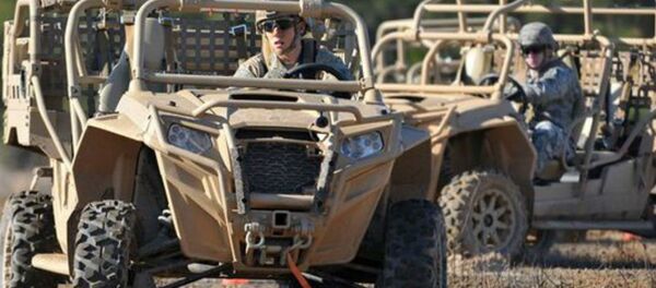 US Army paratroopers drive Light Tactical All Terrain Vehicles (LTATV) through a familiarization course on Fort Bragg, North Carolina. US Army paratroopers drive Light Tactical All Terrain Vehicles (LTATV) through a familiarization course on Fort Bragg, North Carolina. - Sputnik International